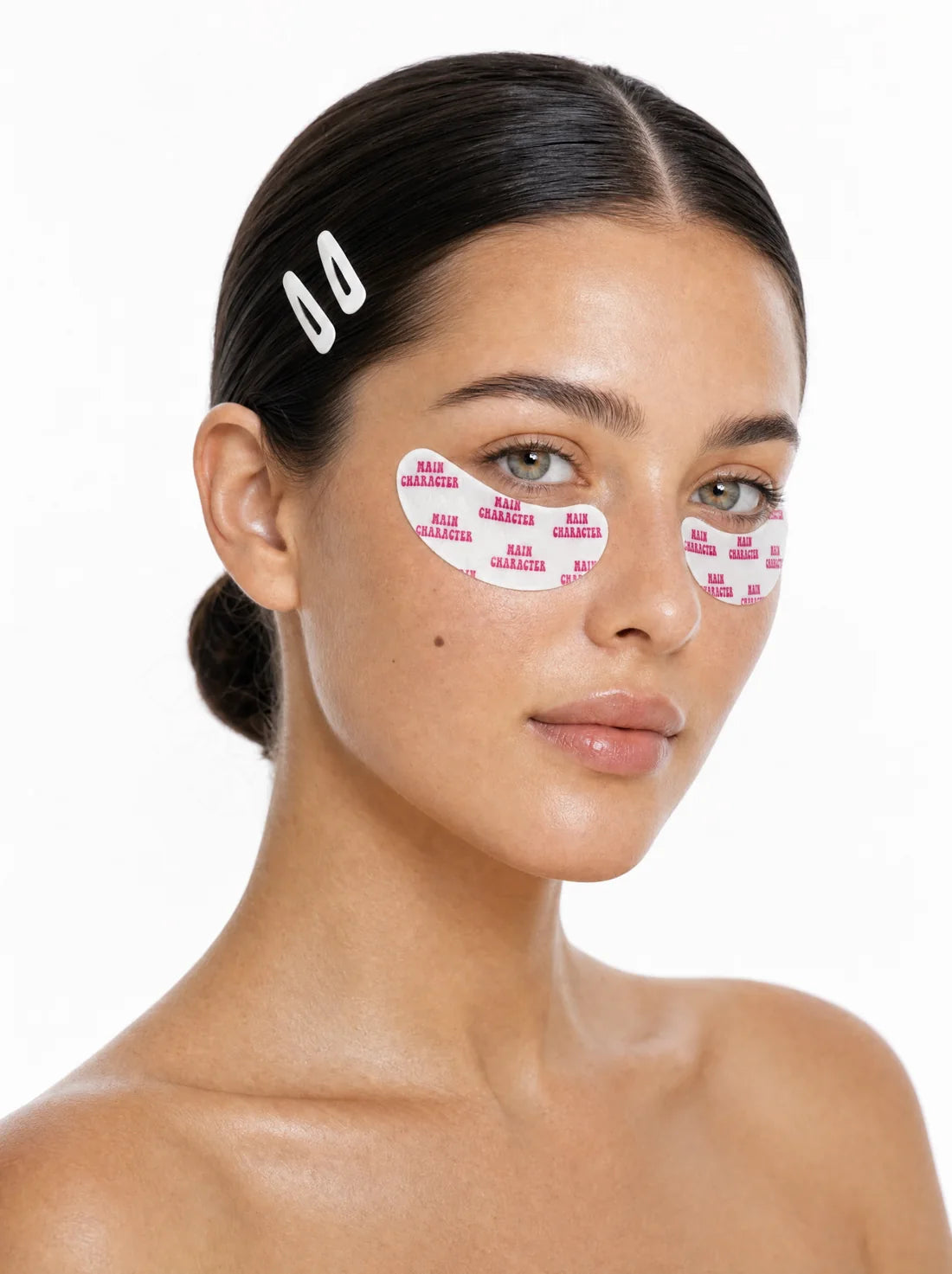 Main Character printed under-eye pads shown on a model